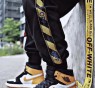OFF-WHITE side tape pants