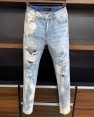 AMIRI Skinny Whitewash Distressed Jeans